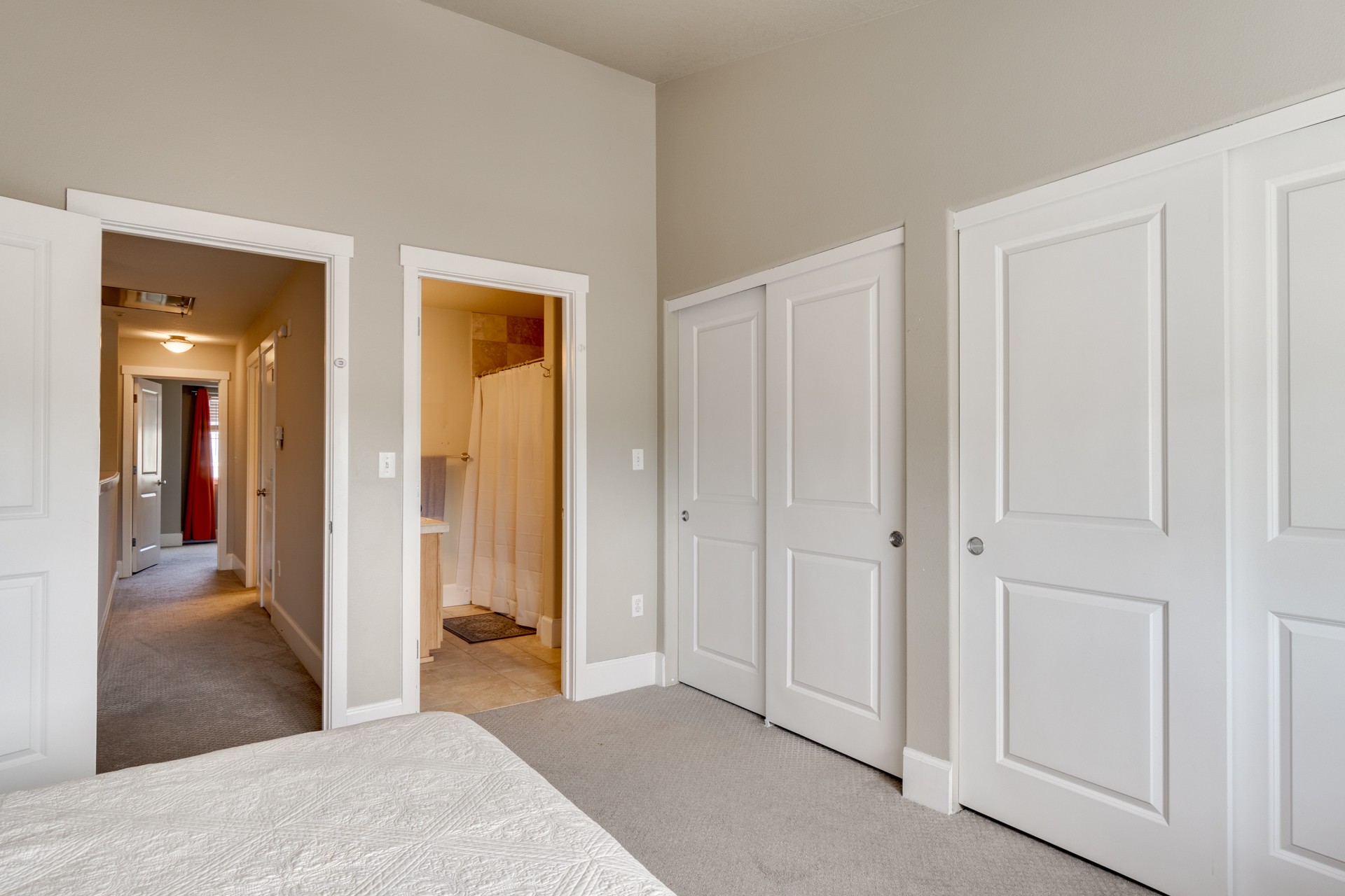 Owner's Suite with double closets and an attached bathroom